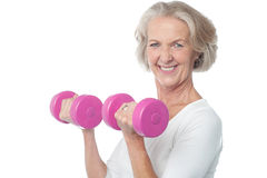 Woman Lifting Dumbbells