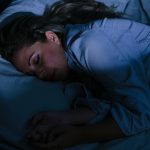 Woman,Peacefully,Sleeping,In,Bed,At,Night