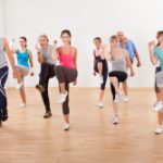 Group of people doing aerobics exercises