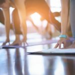 Group,Young,Woman,Doing,Yoga,And,Stretching,Exercises,In,The